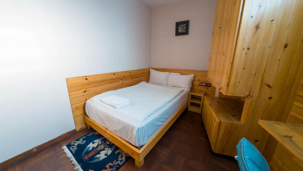 Postel nebo postele na pokoji v ubytování Lalit Service Apartment