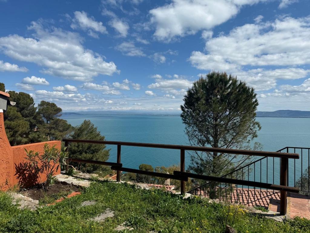 a view of the ocean from a house at Vista Mare in Porto Santo Stefano