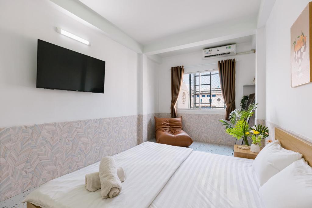 Postel nebo postele na pokoji v ubytování Elysian Home