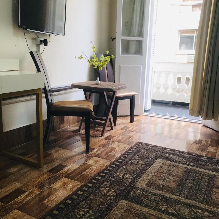 TV a/nebo společenská místnost v ubytování Pa la ce court