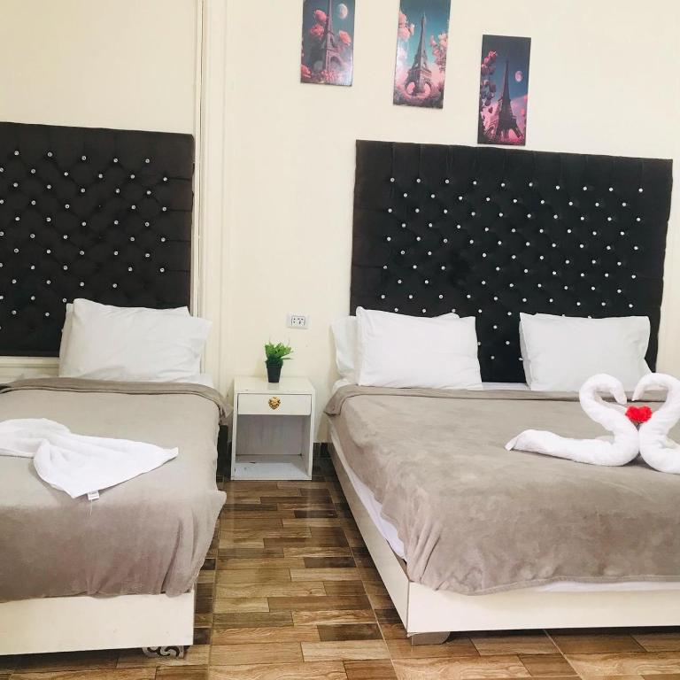 Postel nebo postele na pokoji v ubytování Pa la ce court