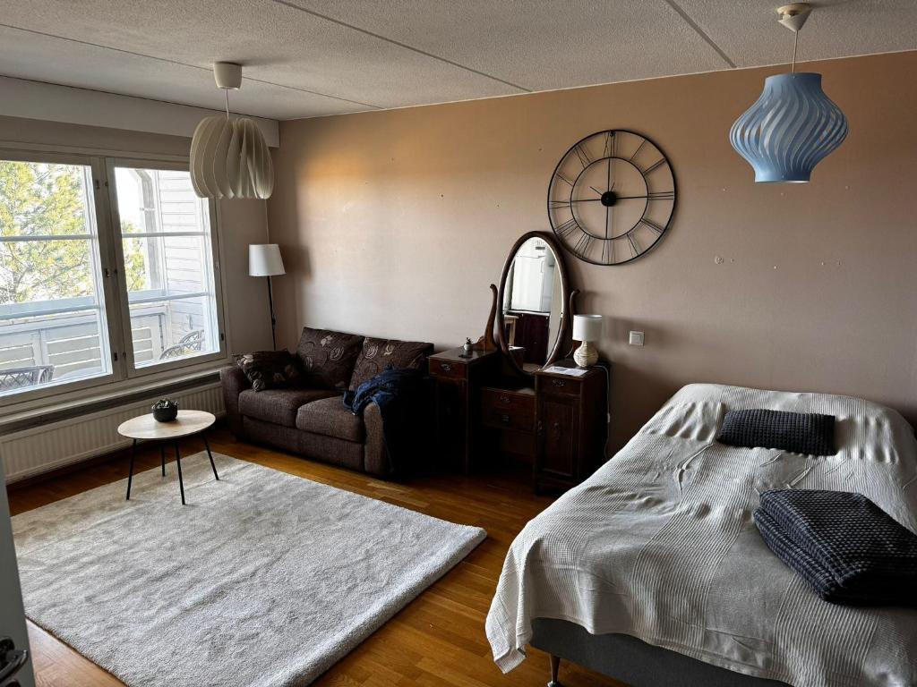 Ένα ή περισσότερα κρεβάτια σε δωμάτιο στο RD Apartments - Pispalan Aarre