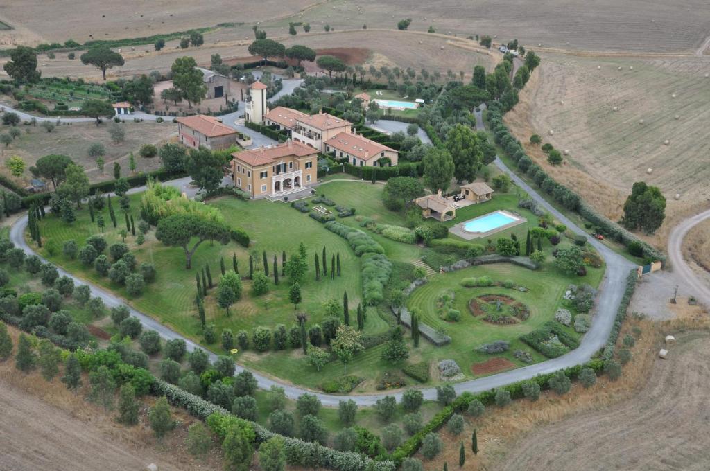 an aerial view of a house with a garden at Casale DI Tormaggiore Villa And Country Suites in Pomezia