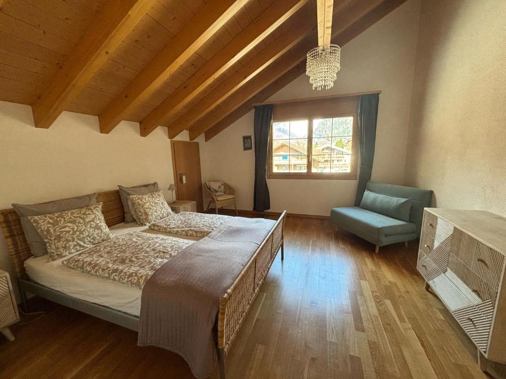 Postel nebo postele na pokoji v ubytování Charming Penthouse