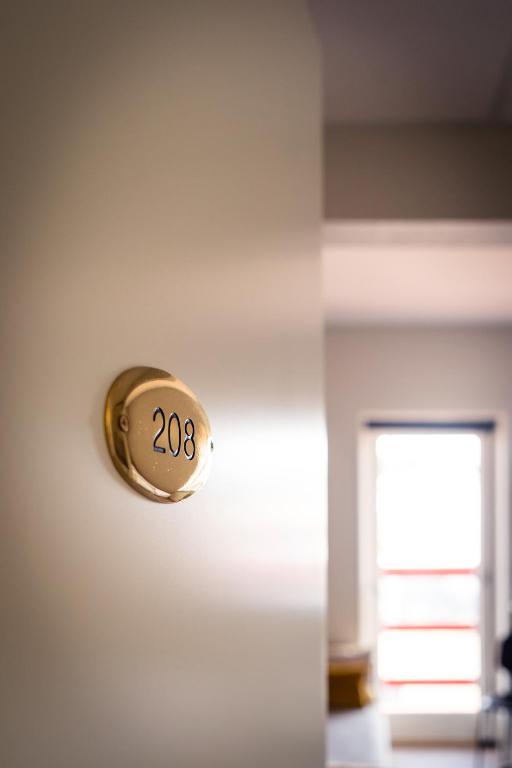 a door handle with the number on it at HOTEL SØMA Ilulissat in Ilulissat