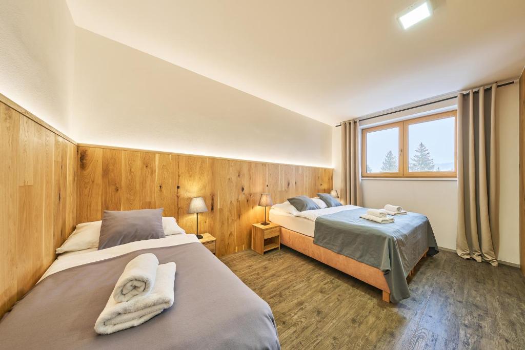 Una cama o camas en una habitación de Hotel Obzor