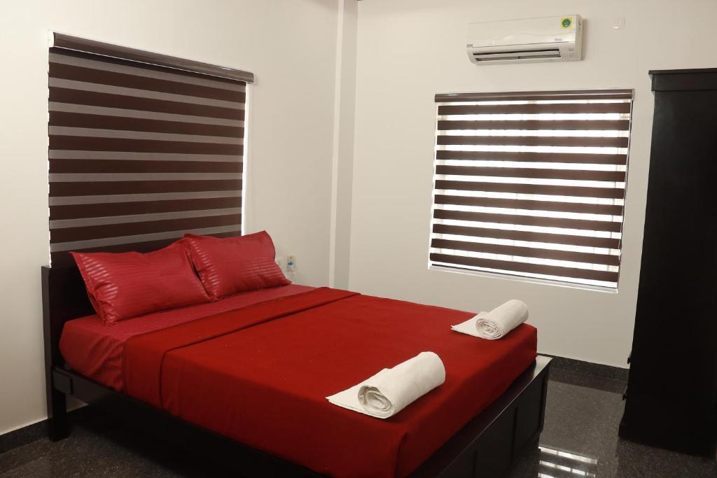 Postel nebo postele na pokoji v ubytování BEVERLY SUITES