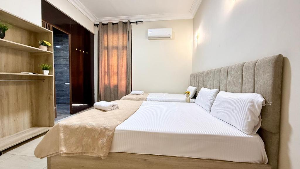 Postel nebo postele na pokoji v ubytování La Bella Casa Hostel