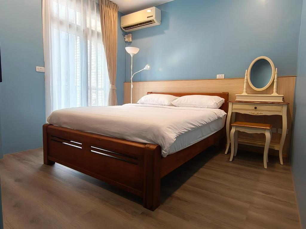 Postel nebo postele na pokoji v ubytování Shan Hai Yun Jian