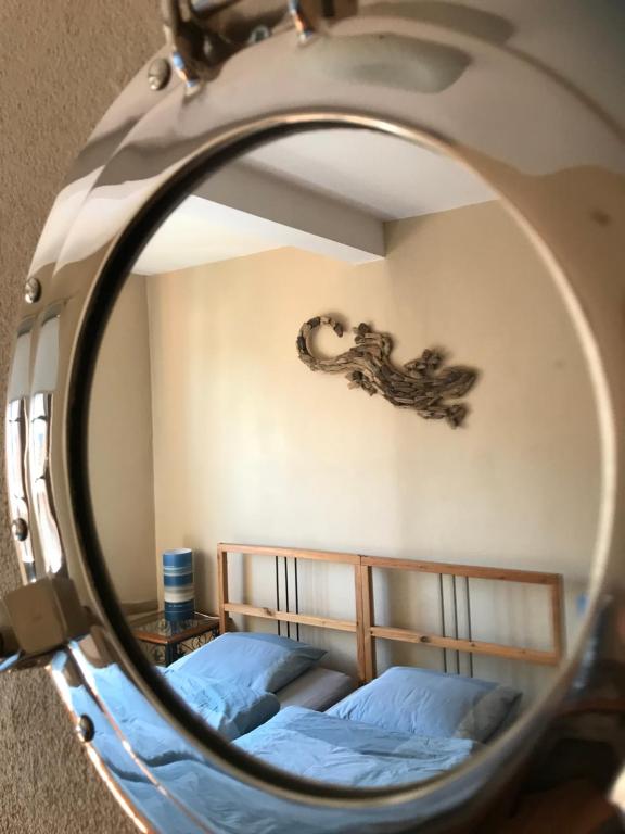 Postel nebo postele na pokoji v ubytování L'Ancienne Distillerie