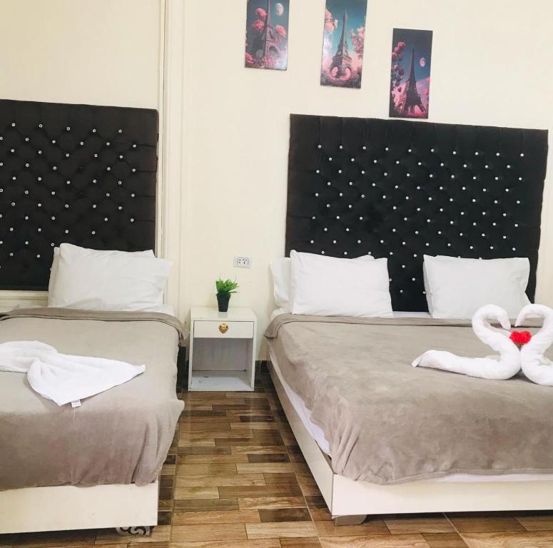 Postel nebo postele na pokoji v ubytování Pa la ce court