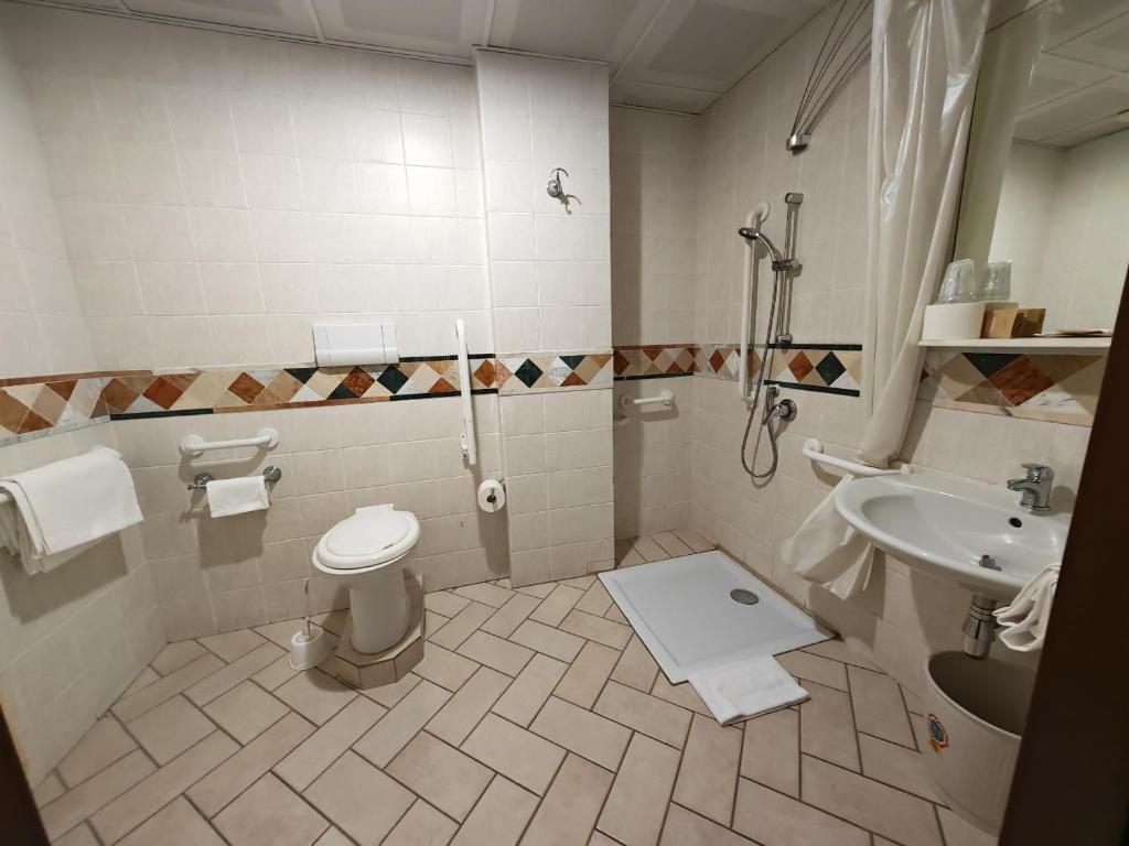 Koupelna v ubytování Hotel Pace