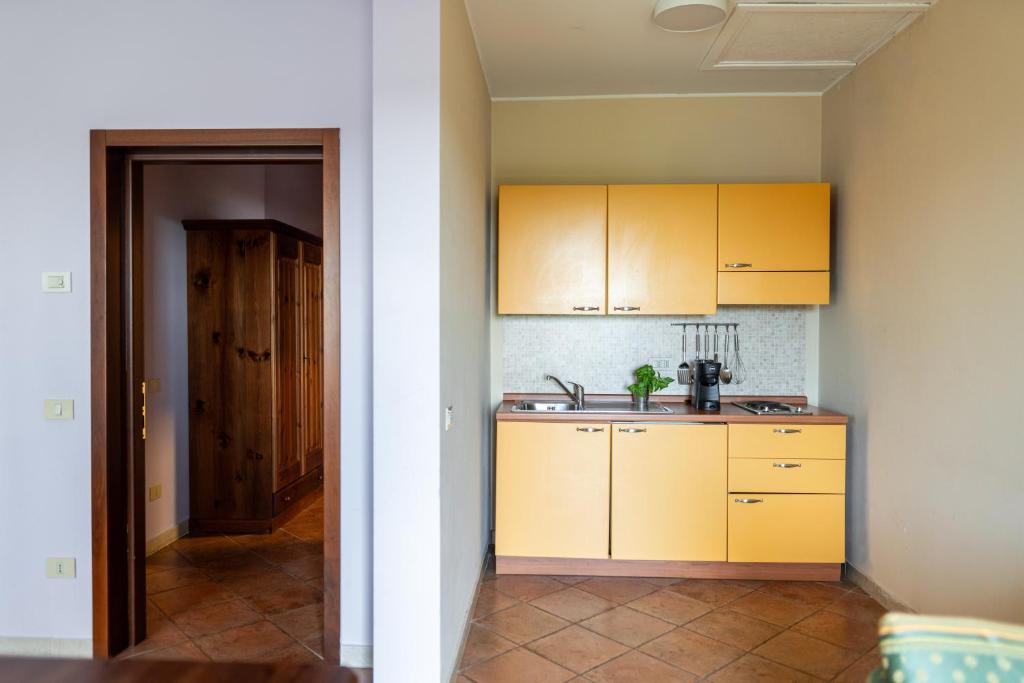 Kuchyň nebo kuchyňský kout v ubytování Agriturismo San Bartolomeo