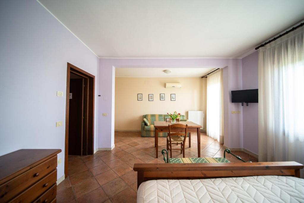 TV a/nebo společenská místnost v ubytování Agriturismo San Bartolomeo