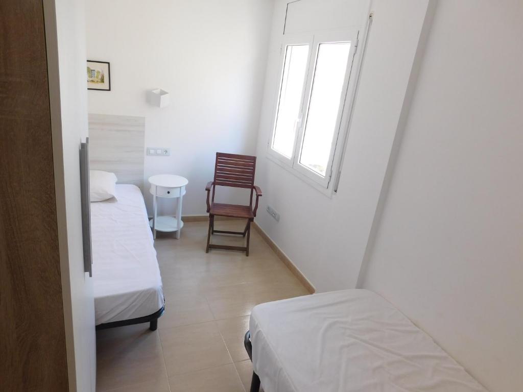 Postel nebo postele na pokoji v ubytování GMID IMMO Apartment Mont Caliu