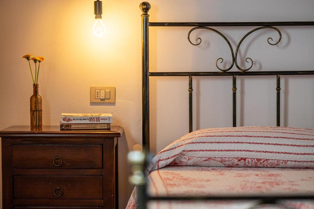 Postel nebo postele na pokoji v ubytování Agriturismo San Bartolomeo