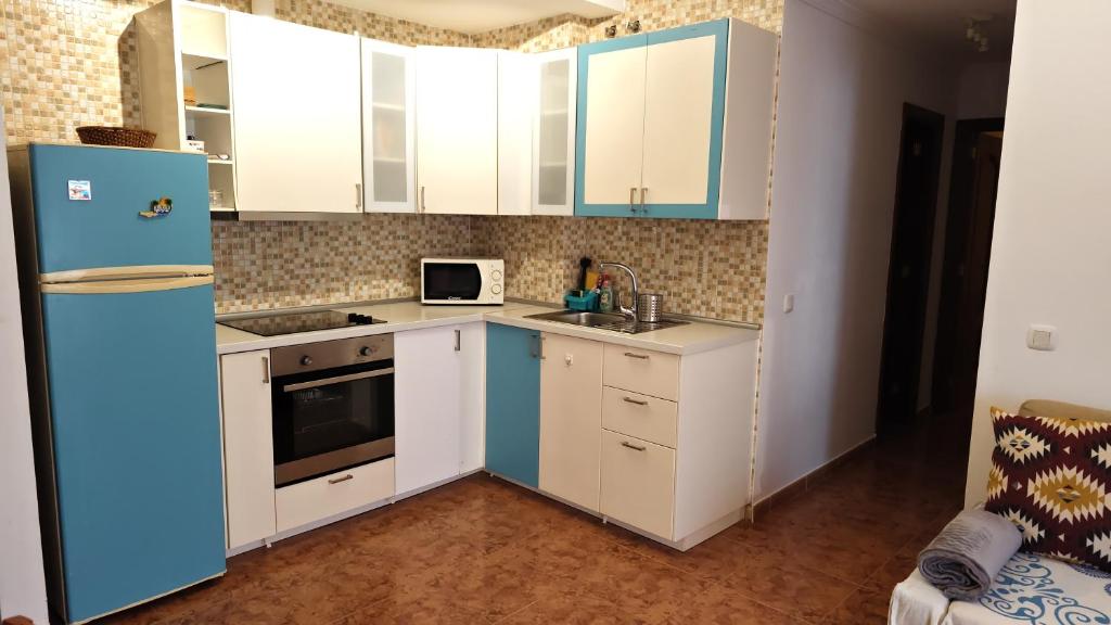 Kuchyň nebo kuchyňský kout v ubytování Mellow Yellow