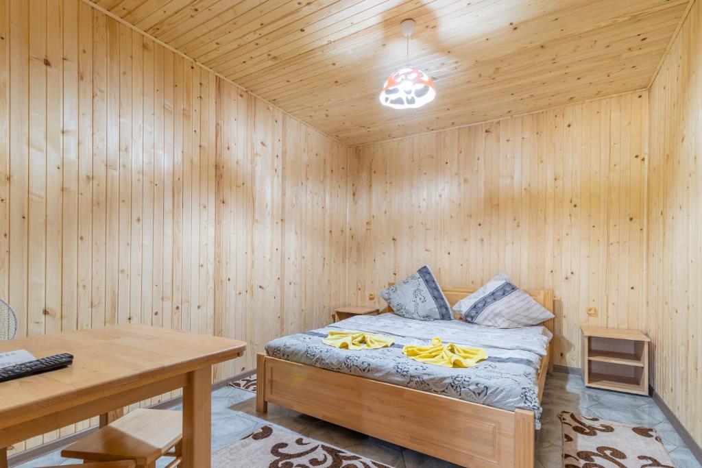 Postel nebo postele na pokoji v ubytování ASTORIA
