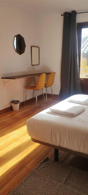 Cama o camas de una habitación en El Tercer Piso