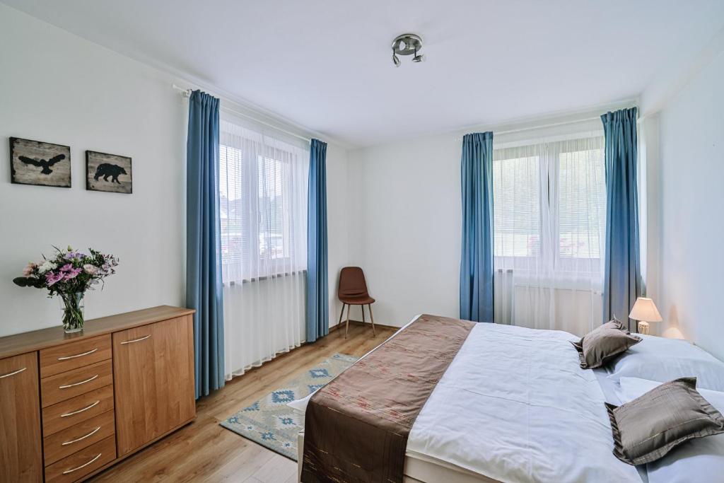 Postel nebo postele na pokoji v ubytování Penzion Drak