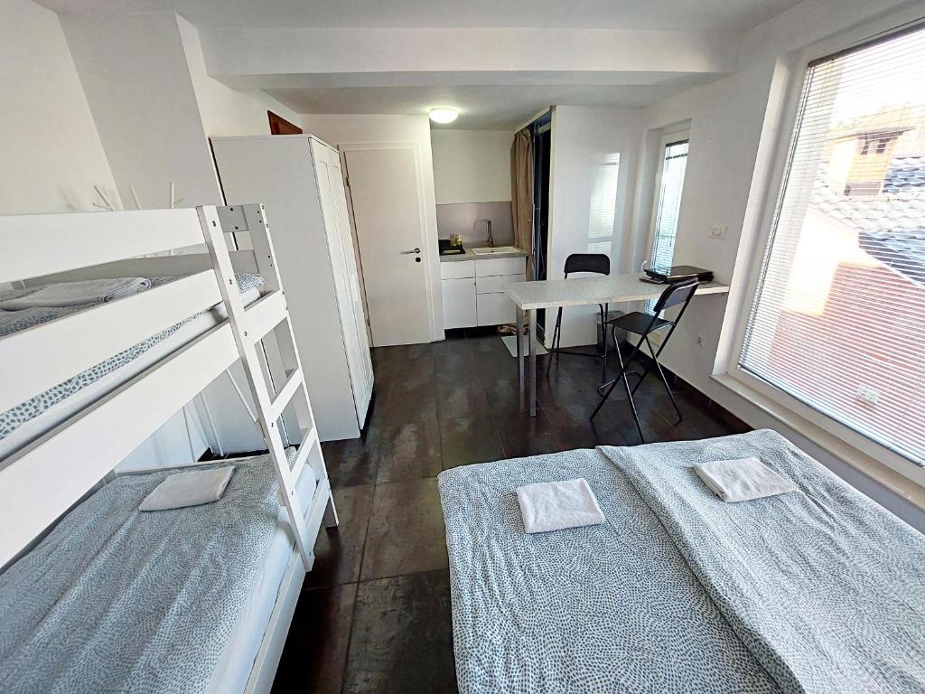 Postel nebo postele na pokoji v ubytování GFS way studios - greenline accomodation