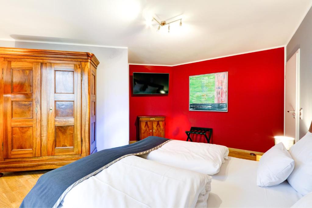 Postel nebo postele na pokoji v ubytování Qube Hotel Bergheim