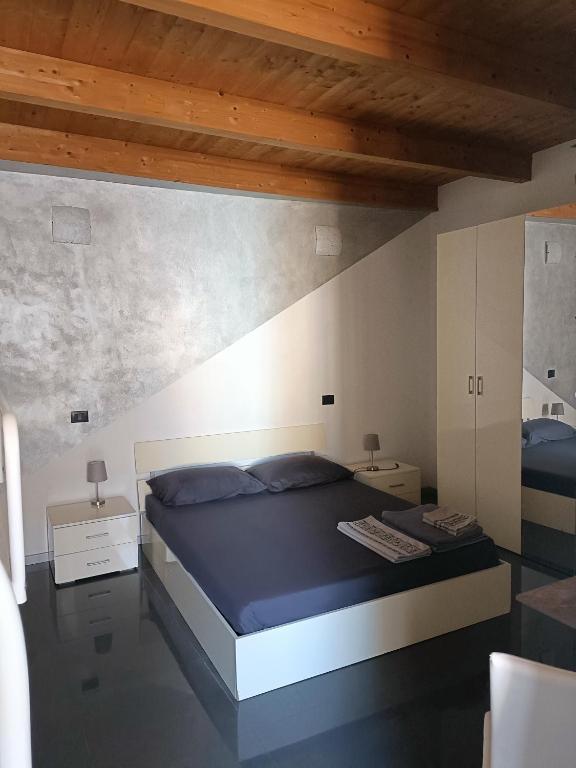 Postel nebo postele na pokoji v ubytování B&B L'Antico Portico