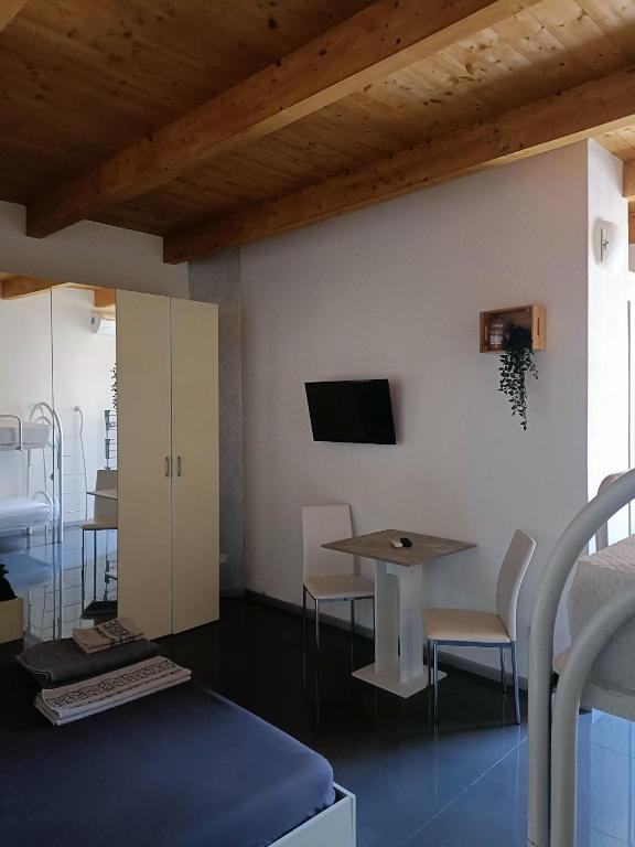 TV a/nebo společenská místnost v ubytování B&B L'Antico Portico