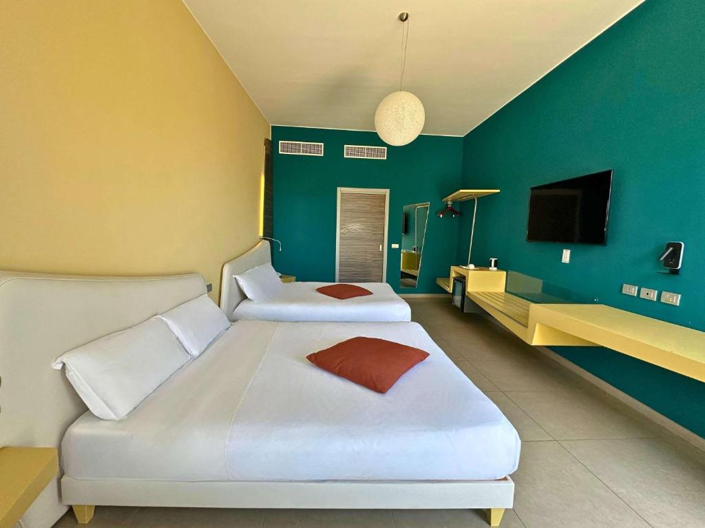 TV a/nebo společenská místnost v ubytování ibis Styles Catania Acireale