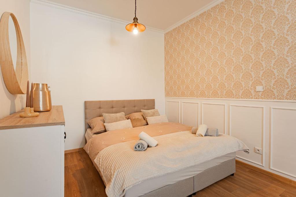 Postel nebo postele na pokoji v ubytování Resort Červený dvůr