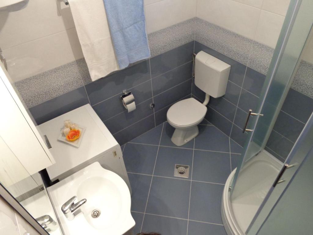 Koupelna v ubytování Apartments Kekica