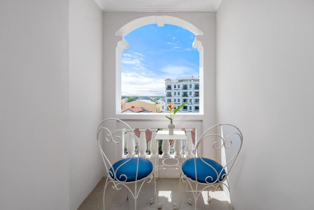 Khu vực ghế ngồi tại Hoi An Garden Palace and Spa - A Boutique Inspired by Nature