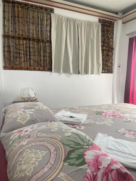 Postel nebo postele na pokoji v ubytování Popo isso homestay