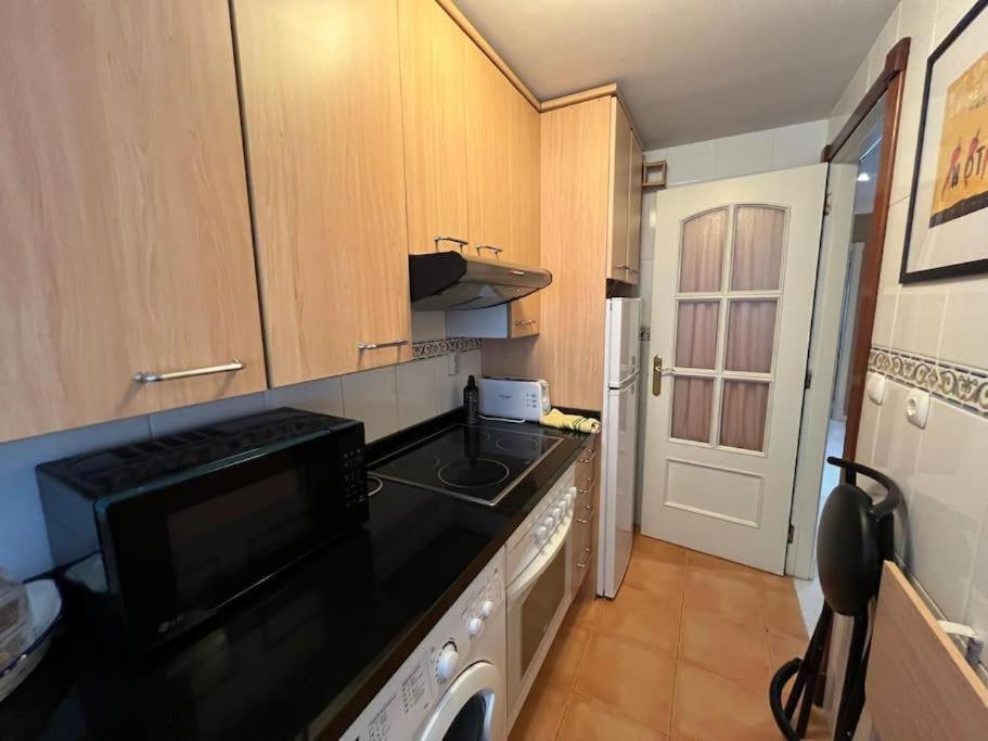 Kuchyň nebo kuchyňský kout v ubytování Apartamento Puerto Estepona