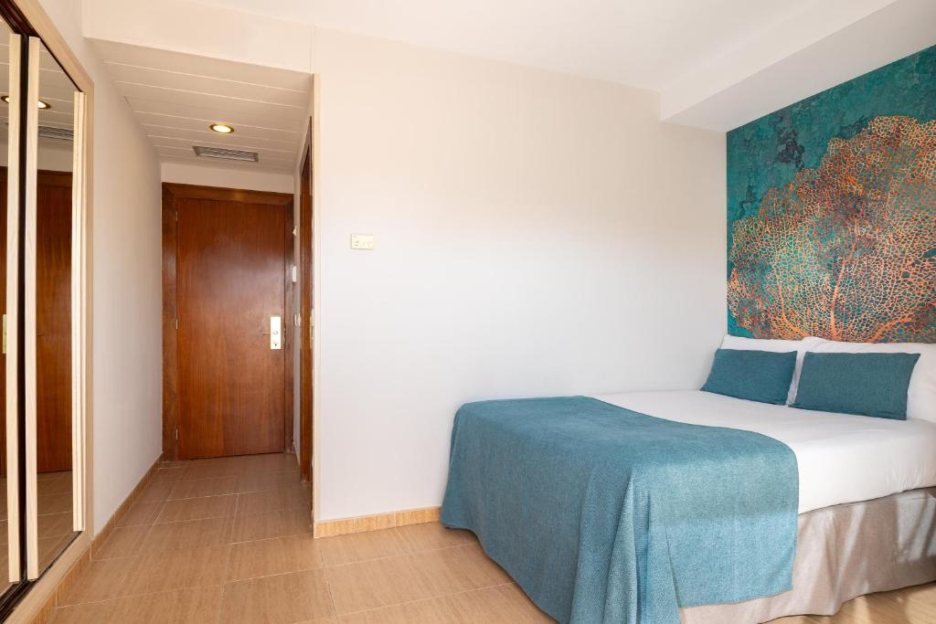 Postel nebo postele na pokoji v ubytování htop Amaika & SPA 4Sup - Adults Only #htopBliss