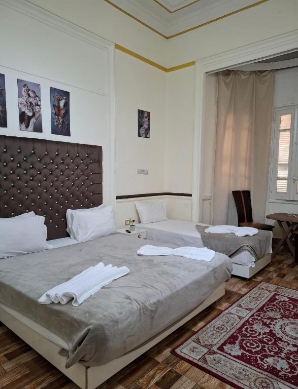Postel nebo postele na pokoji v ubytování Pa la ce court