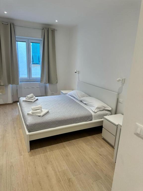 Postel nebo postele na pokoji v ubytování Sapri 29 Rooms