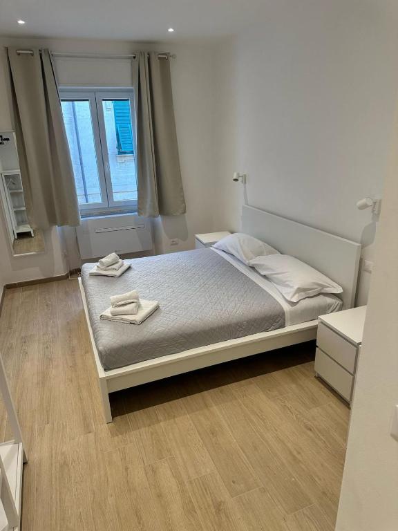 Postel nebo postele na pokoji v ubytování Sapri 29 Rooms