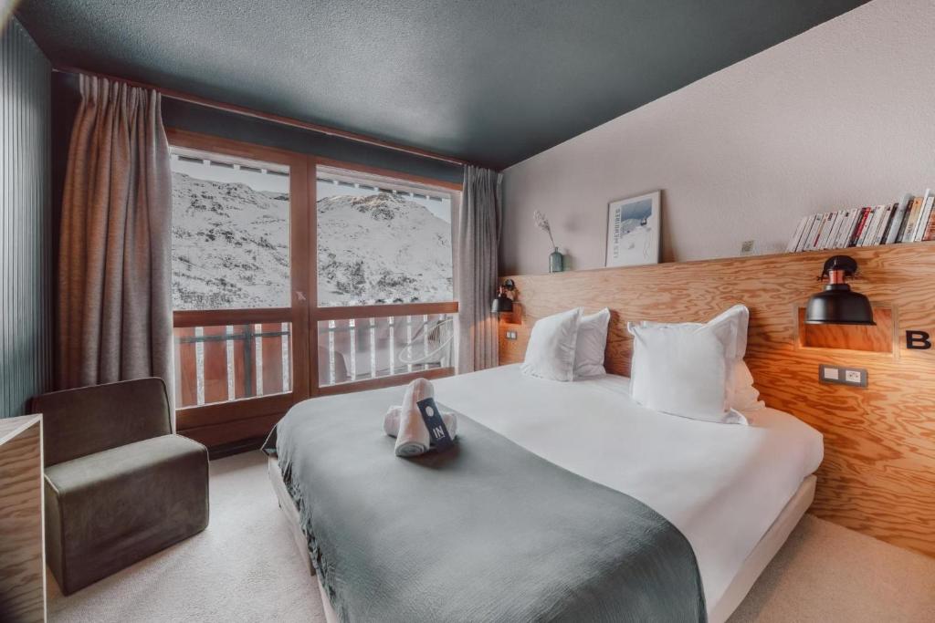 Postel nebo postele na pokoji v ubytování Alpeen Hotel