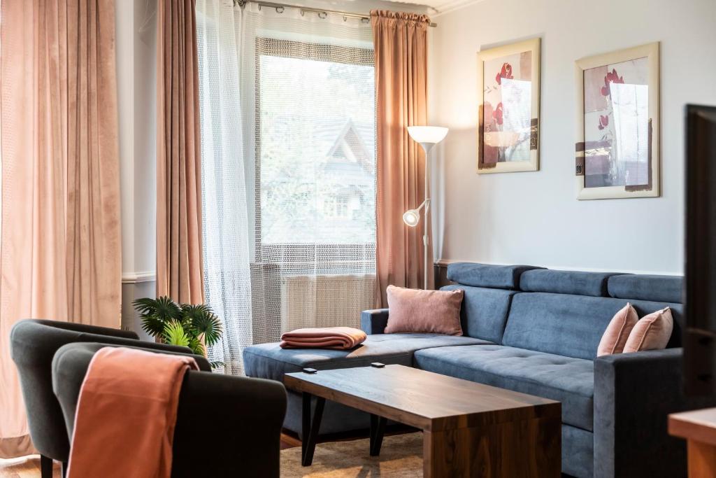 Posedenie v ubytovaní TatryTOP Apartamenty Kaszelewski