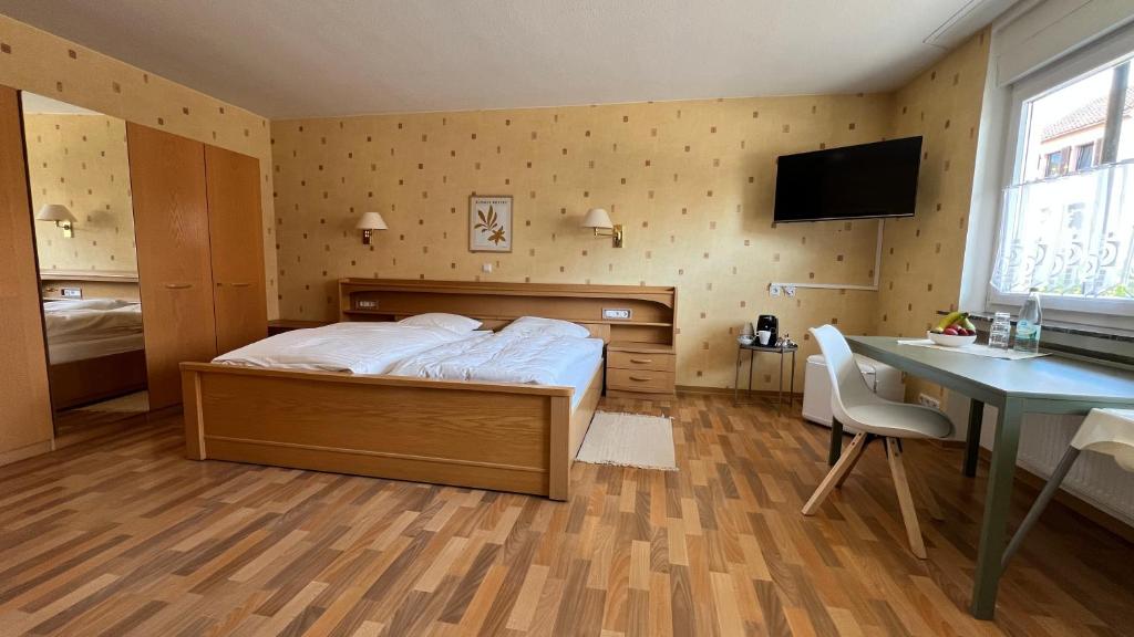 Postel nebo postele na pokoji v ubytování Gästehaus Kliebenstein