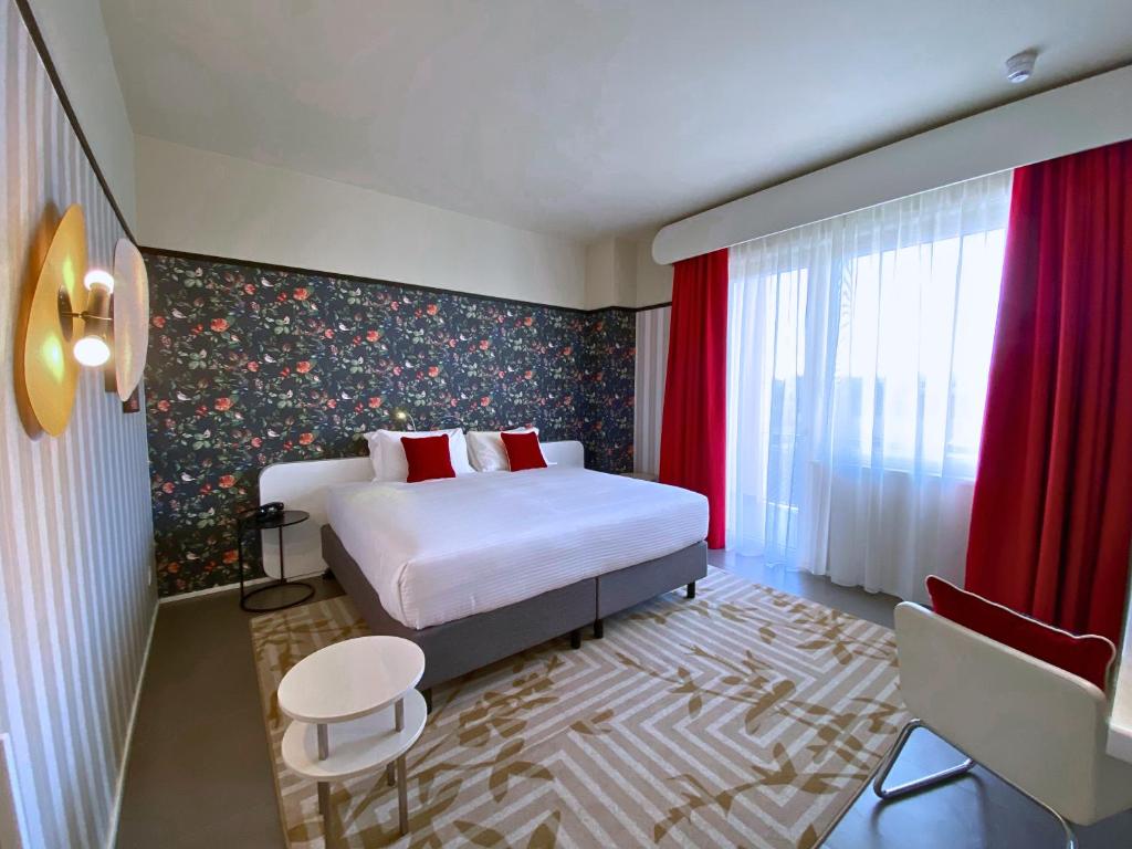 Postel nebo postele na pokoji v ubytování Hotel Indigo Florence by IHG
