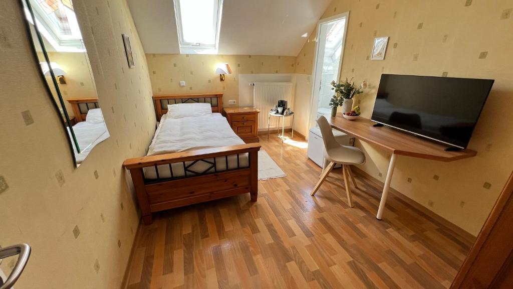 TV a/nebo společenská místnost v ubytování Gästehaus Kliebenstein