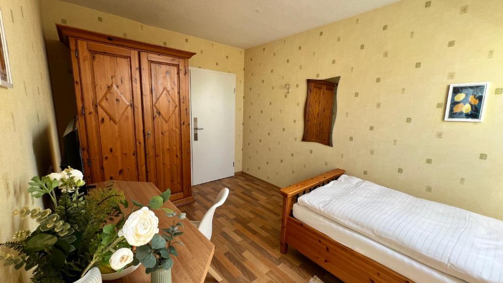 Postel nebo postele na pokoji v ubytování Gästehaus Kliebenstein