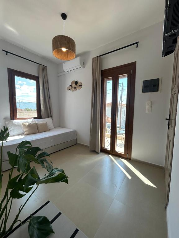 Postel nebo postele na pokoji v ubytování KYNTHIA seaview apartments samos