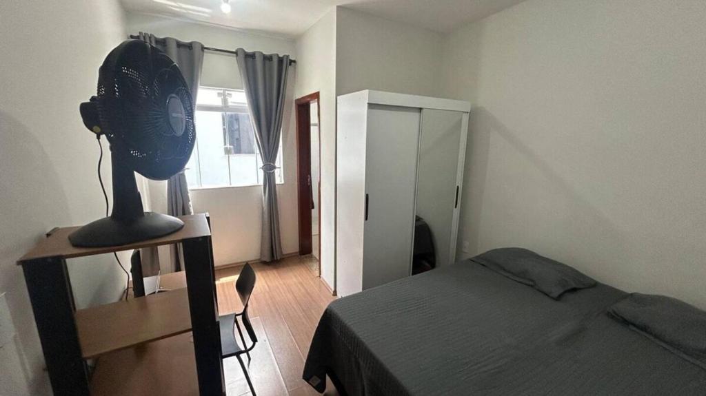 En eller flere senge i et værelse på Santa Branca Easy Stay 01