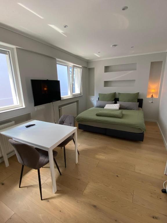 TV a/nebo společenská místnost v ubytování Ausblick residence
