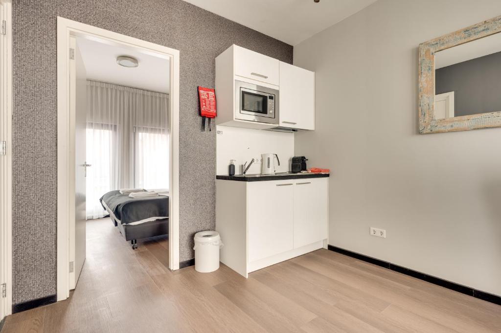 Kuchyň nebo kuchyňský kout v ubytování Hotel Zilt