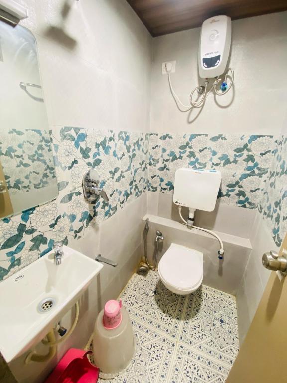 Koupelna v ubytování Hotel RV Residency