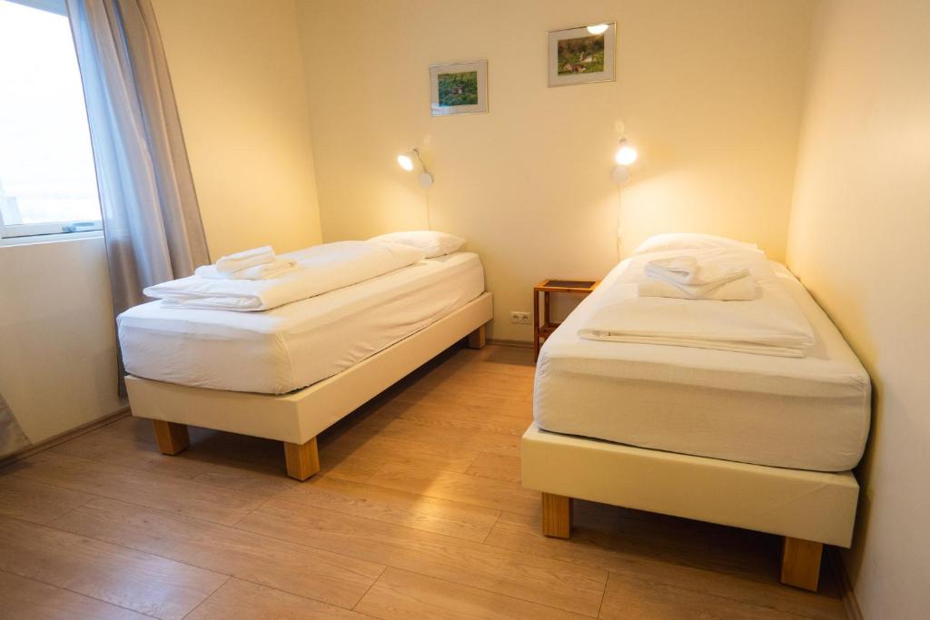 Hotel Studlagil房間的床